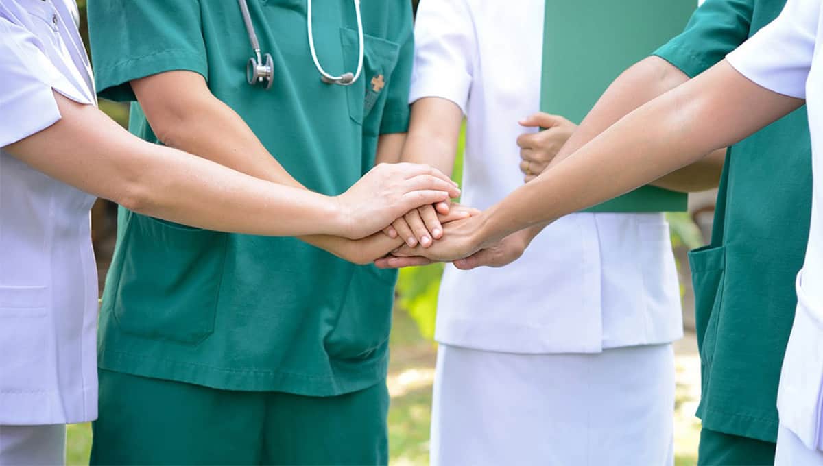 Friendly pharmacist assisting a customer